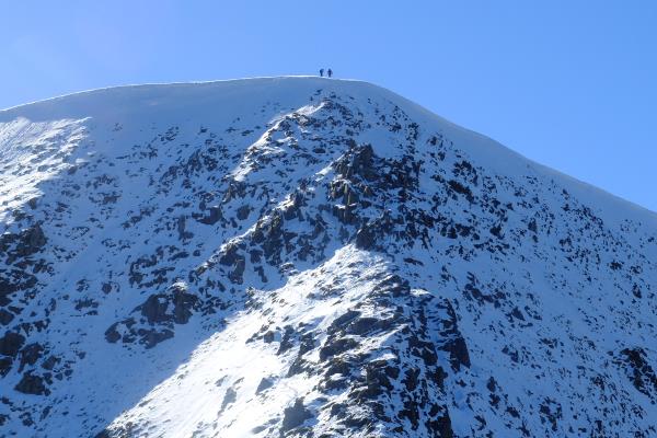 Photo of Two unknown walkers completing Swirral Edge