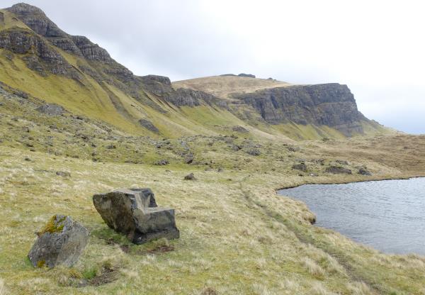 Photo of Natural armchair shaped rock by lochan to south of Lochan a' Bhealaich Bhig