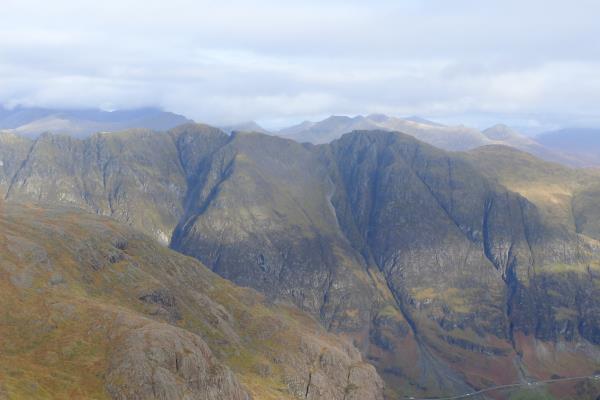 Photo of Distant views of Ben Nevis to left in the clouds and Grey Corries in middle